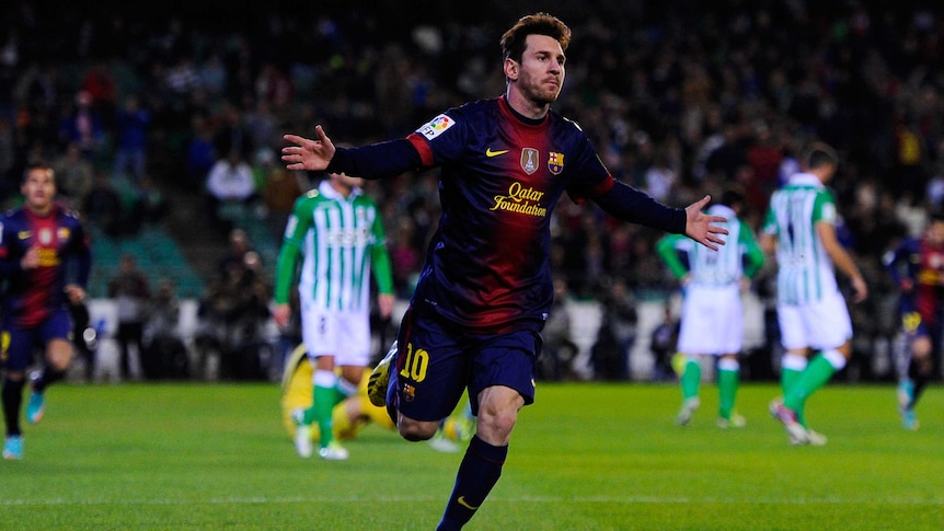 Living legend ... Barcelona's Lionel Messi scored twice against Real Betis to make it 86 goals for 2012.
