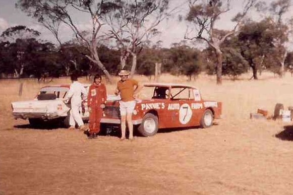 A photo of John Jenkin with friend Jack Payne and the car they built and raced from 1973.