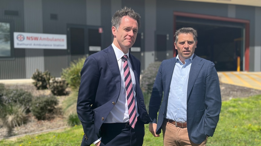 Two men stand outside NSW Bathurst ambulance station 