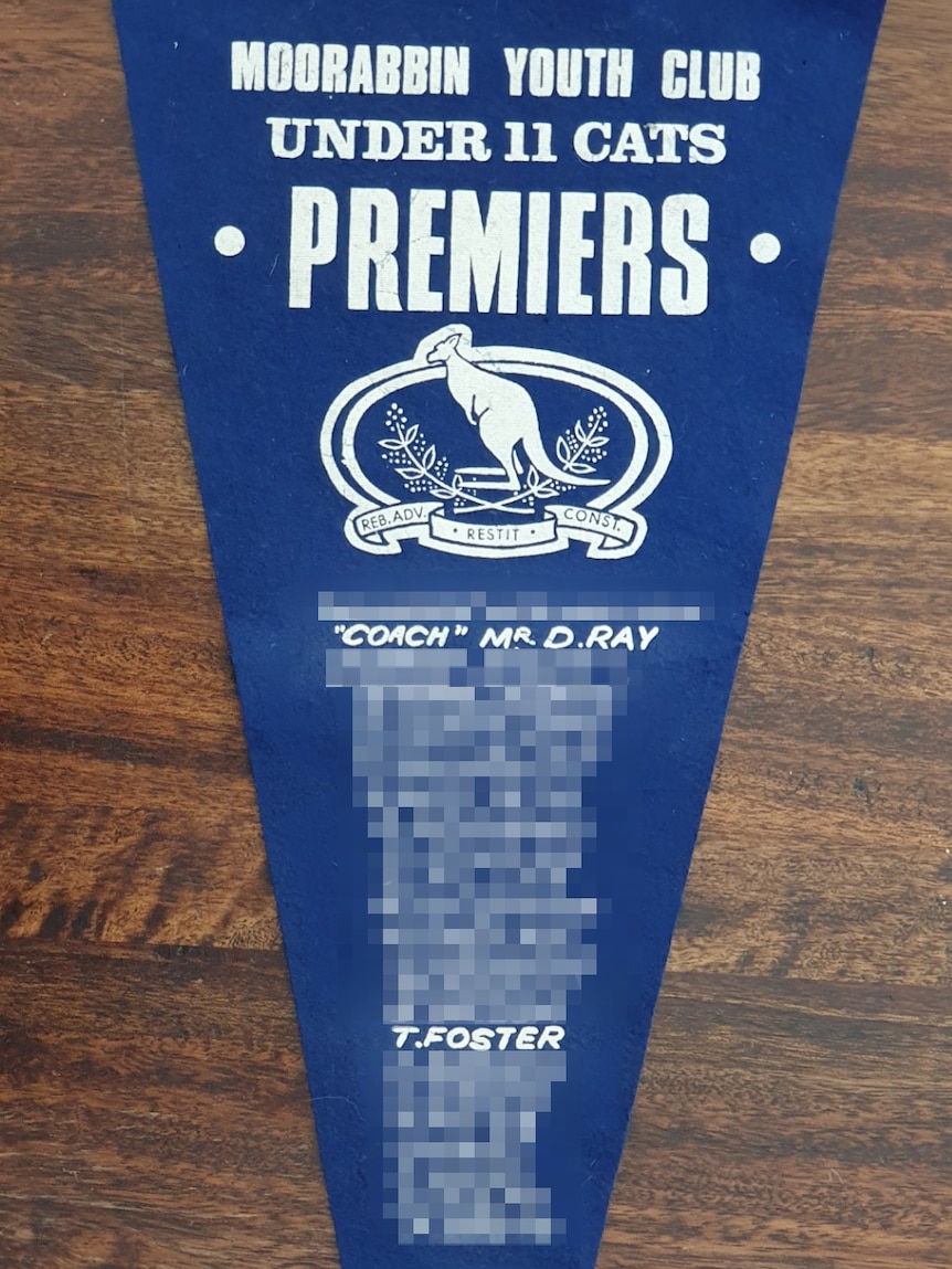 A blue flag with the names of the pennant winners on it.