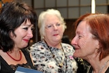Senator Rachel Siewert (right) greets Pamela O'Brien (centre) and her daughter Angela who were in the public gallery.