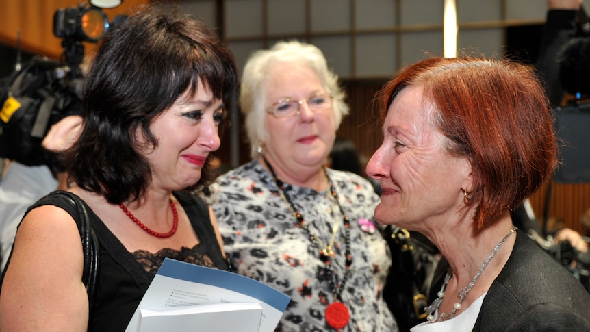 Senator Rachel Siewert (right) greets Pamela O'Brien (centre) and her daughter Angela who were in the public gallery.