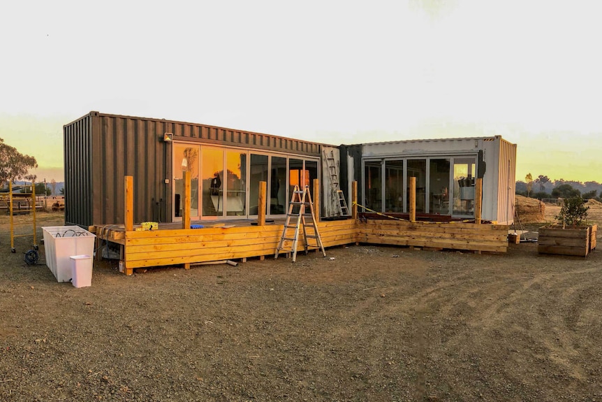 An L-frame container ship set-up with glass walls that will house Taranaki Farm's poultry abattoir.