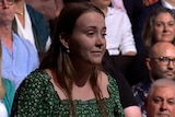 A young woman appears on Q+A.