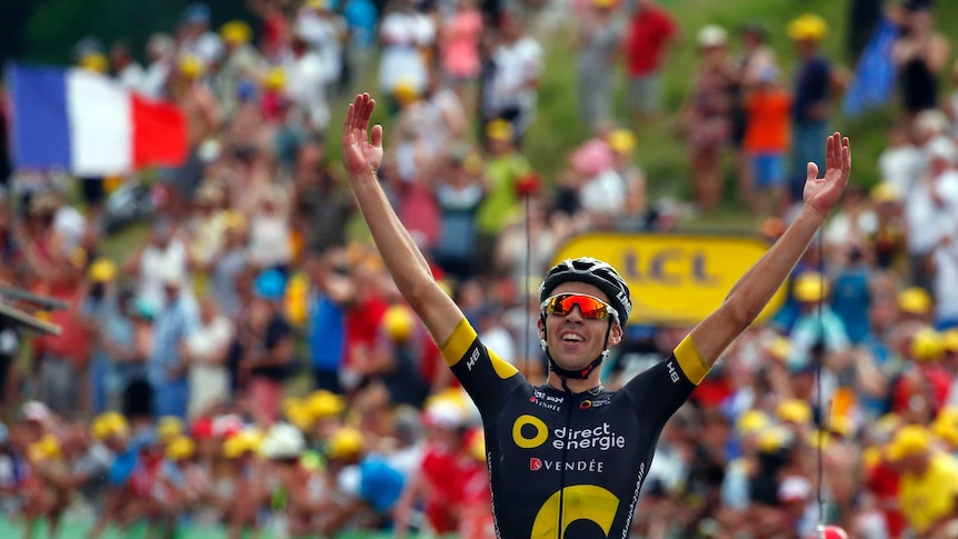 Lilian Calmejane celebrates winning the eighth stage of the Tour de France