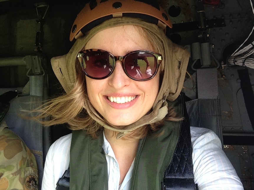 ABC reporter Nadia Daly takes a ride in a Black Hawk helicopter