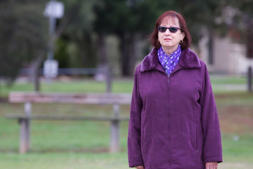 Josephine Greensill alone in a park