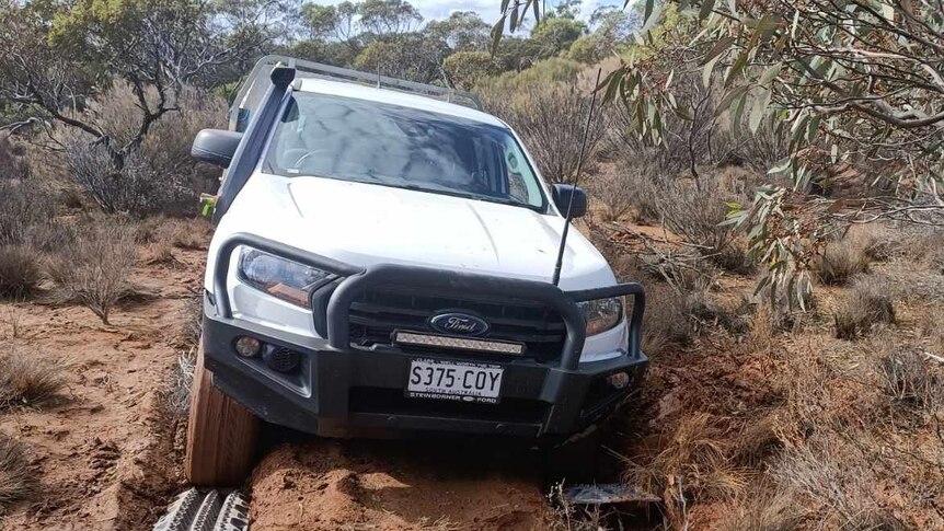 A ute bogged in the outback.
