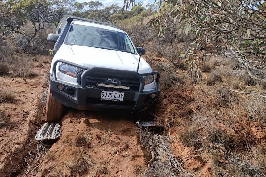 A ute bogged in the outback.