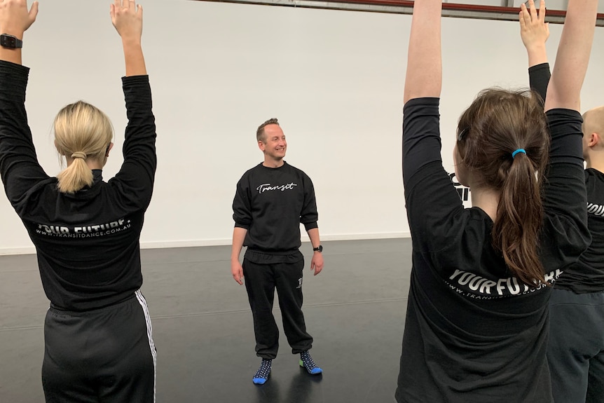 Man leads dance class