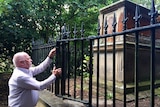 Norm Gibson visits David Gibson's grave