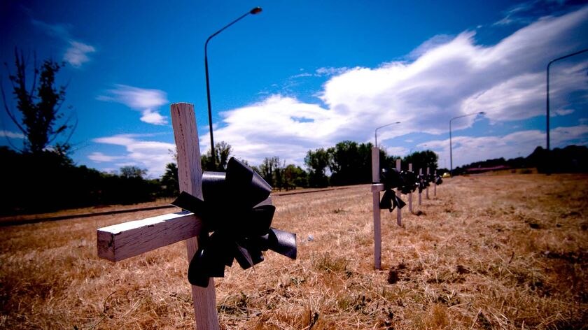 Scene of tragedy: the site was previously marked by seven simple crosses.