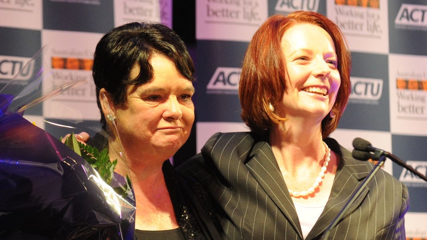 Gillard embraces former ACTU president at farewell dinner