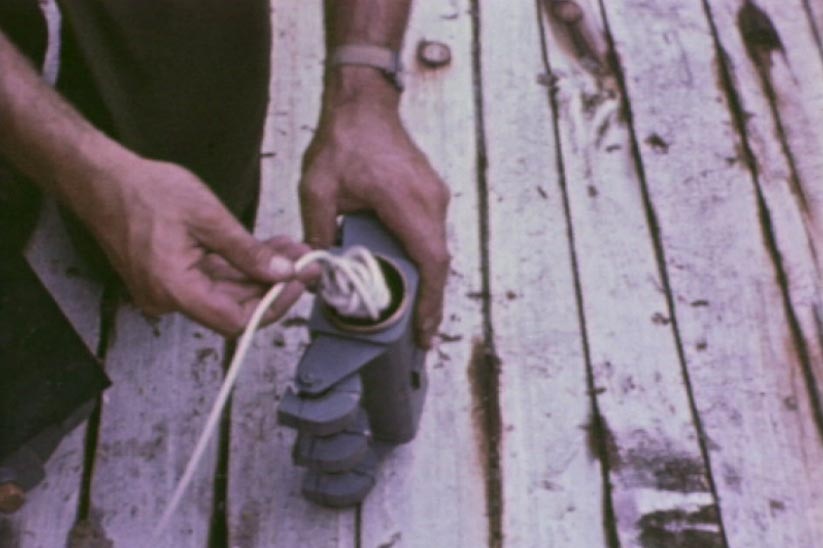 Commando learning how to set a limpet mine