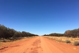 The remote red dirt Sandover Highway.