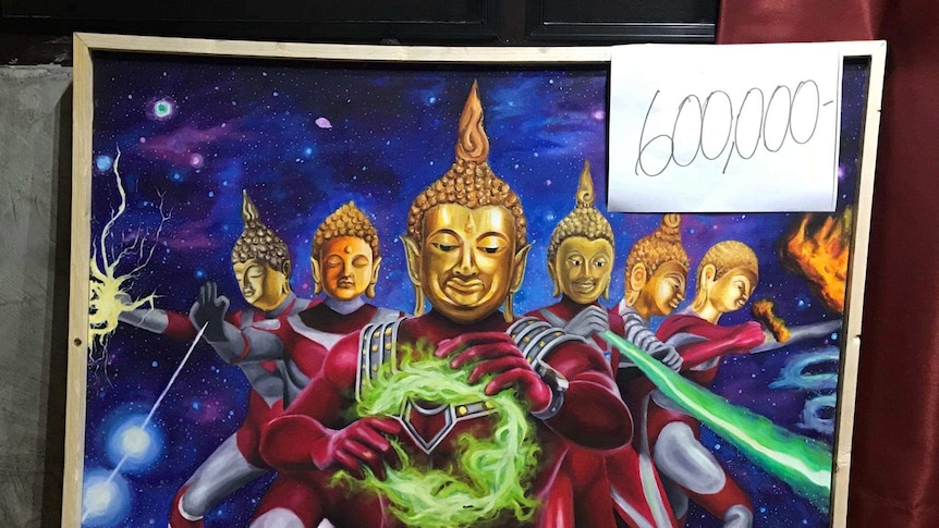A painting shows different guises of Buddha portrayed as an action figure in celestial surrounds