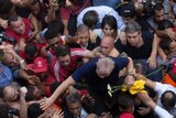 Supporters carrying Lula.