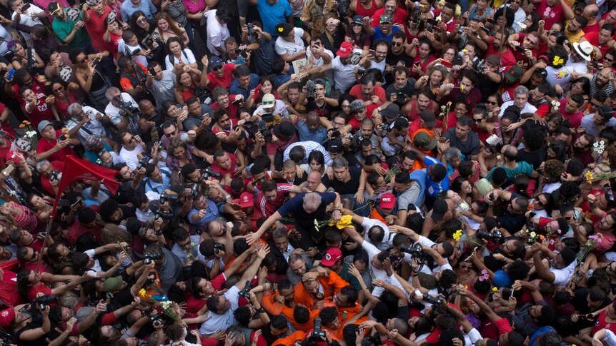 Supporters carrying Lula.