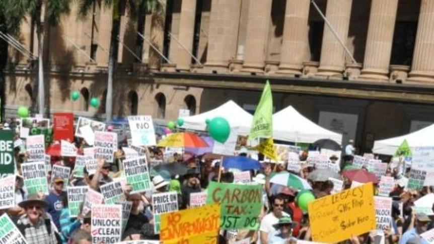 Signs calling for cuts to pollution and more spending on clean energy were littered through the crowd.