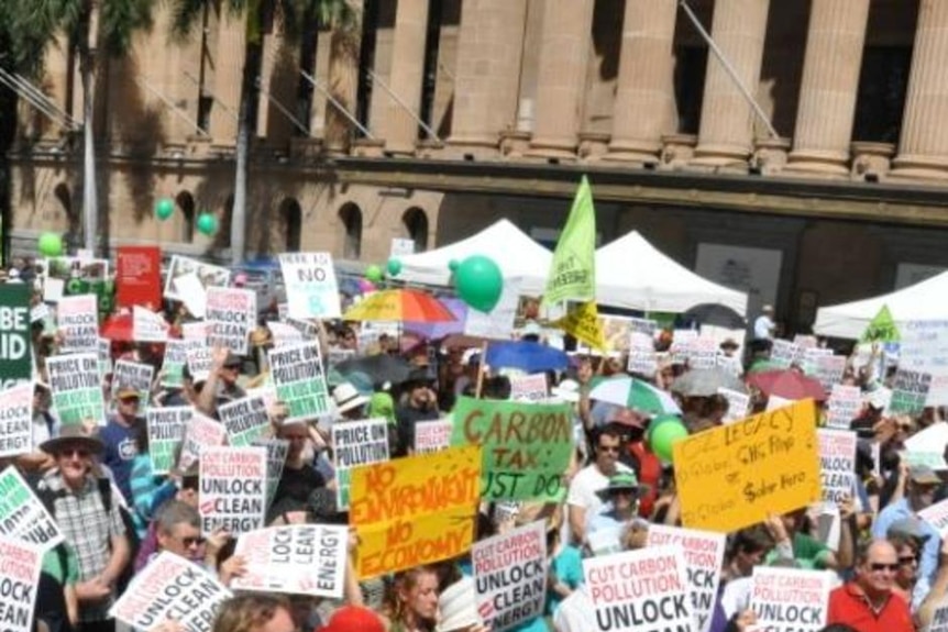 Signs calling for cuts to pollution and more spending on clean energy were littered through the crowd.