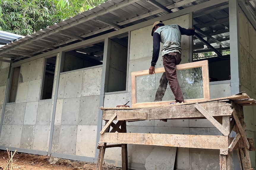 A concrete house and glazier.