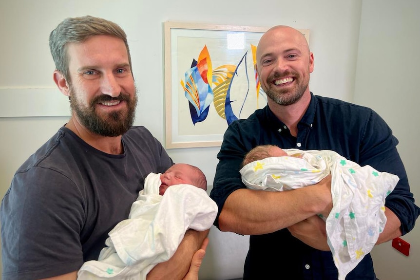 Baby - dads holding babies