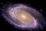 A galaxy spirals somewhere in the universe
