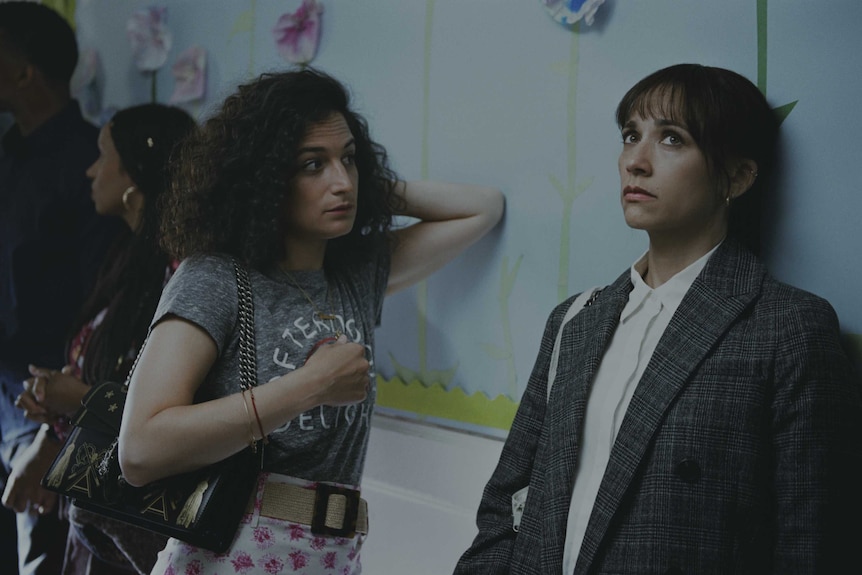 Jenny Slate stands next to Rashida Jones in a scene from the film On the Rocks