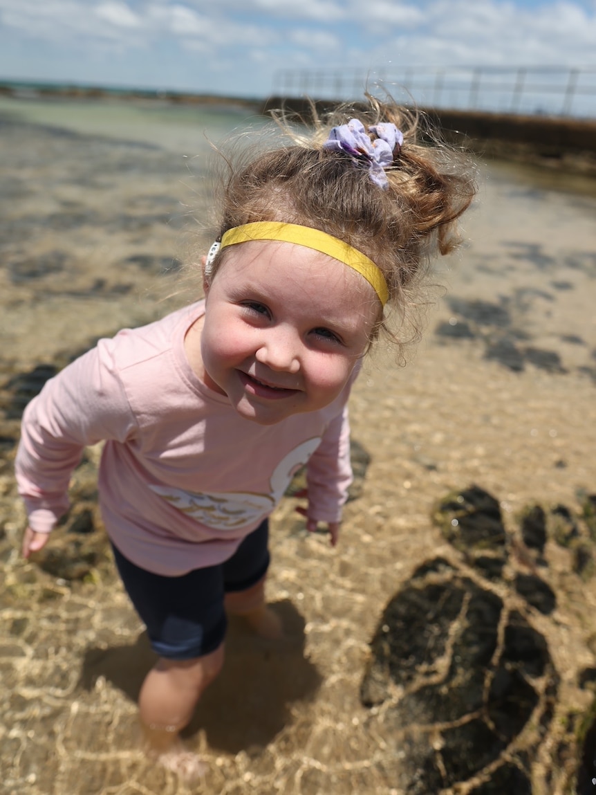 Five year old Tilly at the beach.