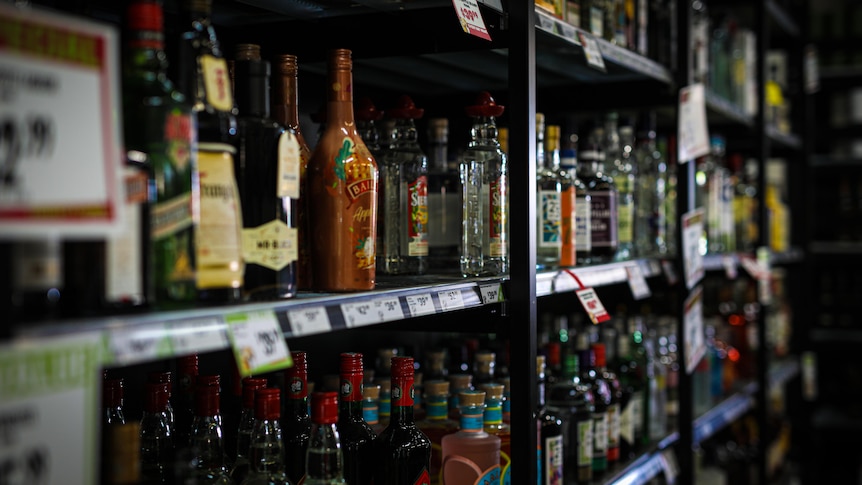 Spirit bottles in an alcohol shop.