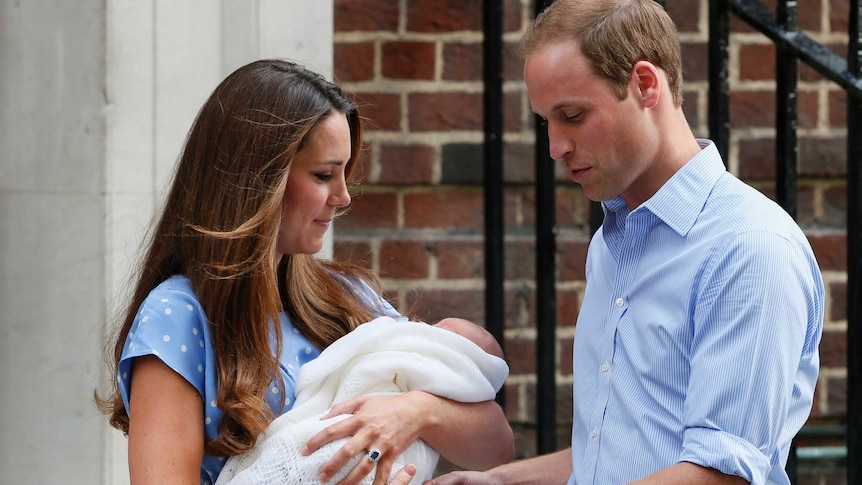 Prince William and Kate show the royal baby off for the first time