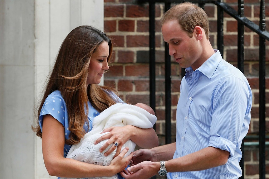 Prince William and Kate show the royal baby off for the first time