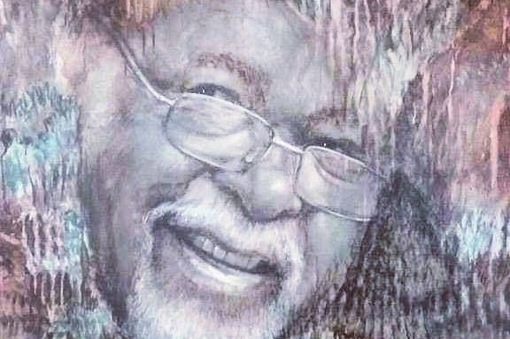 Monochromatic painting of man's face in glasses smiling.