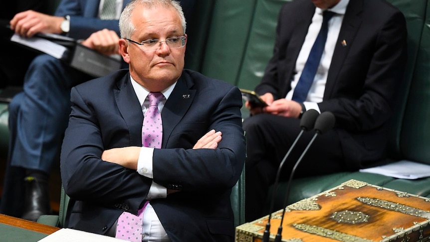 Australian Prime Minister Scott Morrison reacts during House of Representatives Question Time October 16, 2019. 