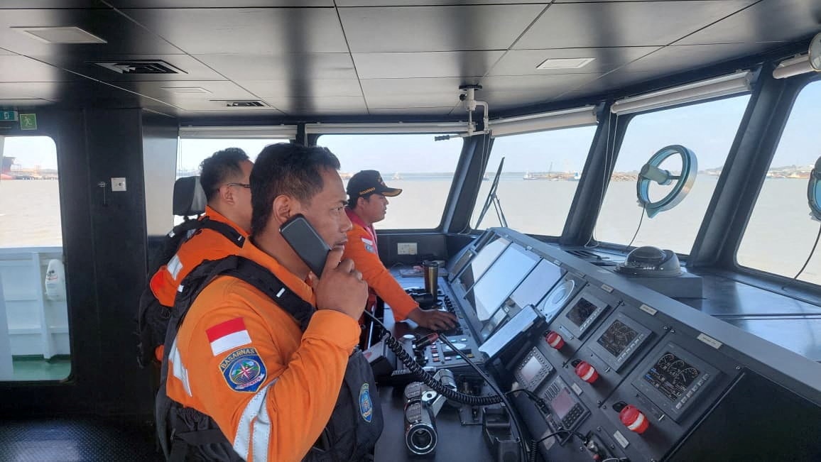 Rescue workers attempt to locate hundreds missing after a passenger ship capsized