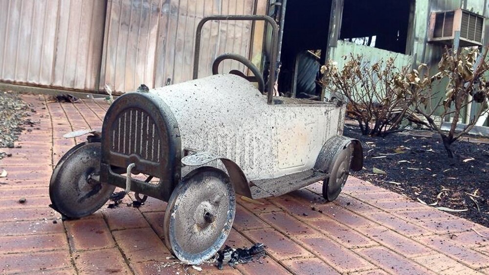 Eliza and Gracie's vintage pushcar was destroyed in the Sampson Flat bushfire.