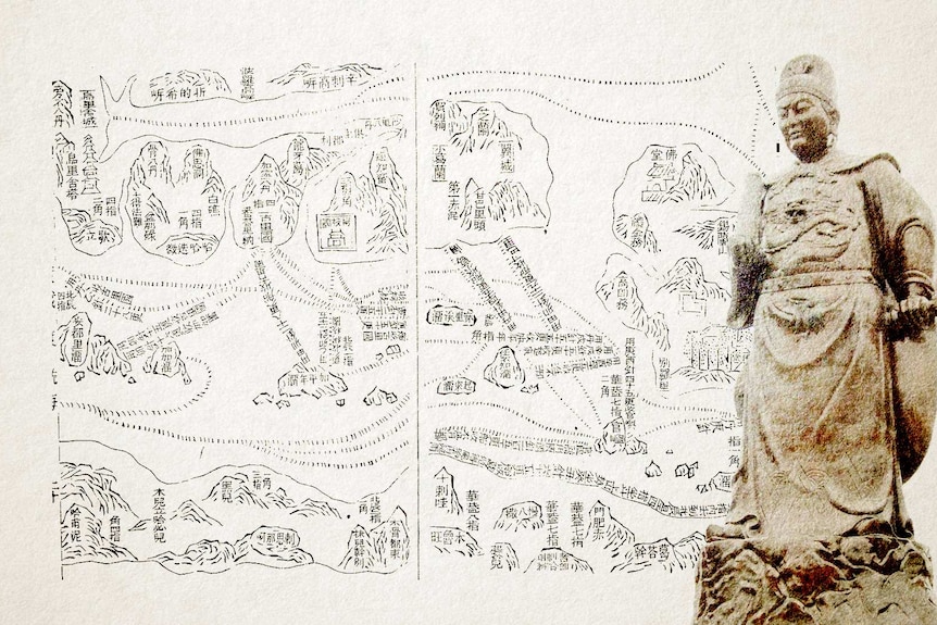 Ancient Chinese map alongside a statue of Zheng He.