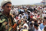 Yemeni anti-government protesters rally after the weekly Friday noon prayers in Sanaa on September 23, 2011.
