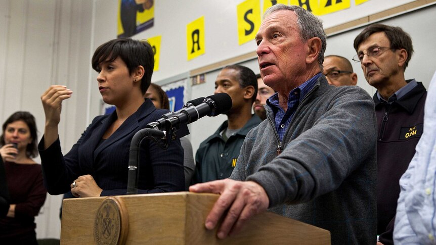 New York City Mayor Michael Bloomberg speaks to members of the media at Seward Park High School on October 28, 2012.