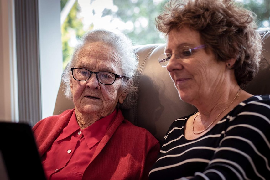 Marie Murray, 92, sits in her house in Sydney with daughter Jenny Rose.