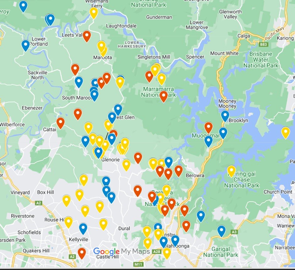 A map of northern Sydney with blue, yellow and red markers