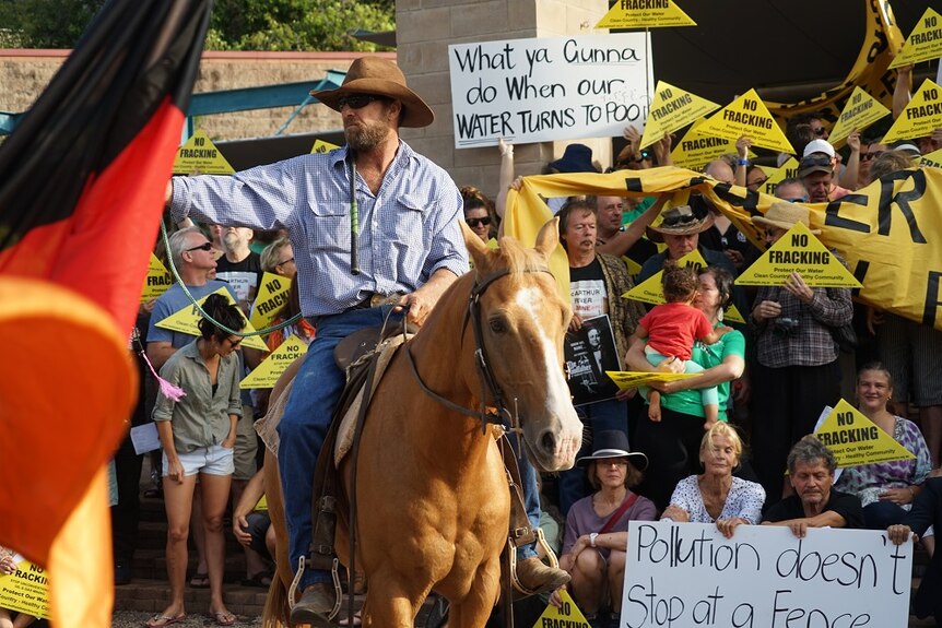 Big River Station owner Daniel Tapp at the protest on horseback