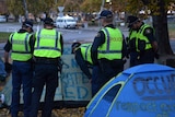 Police prepare to evict homeless protesters at Parliament House, Hobart.