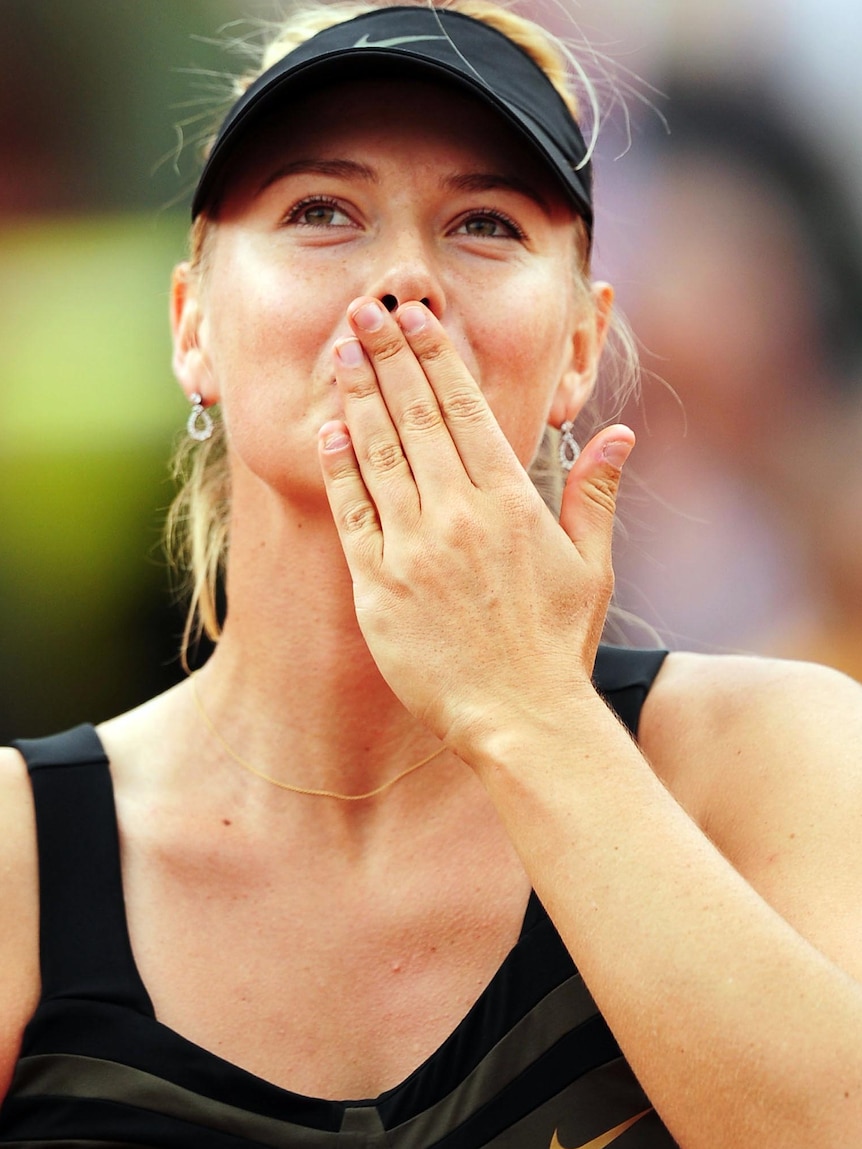 Maria Sharapova celebrates her quarter-final win at the French Open.