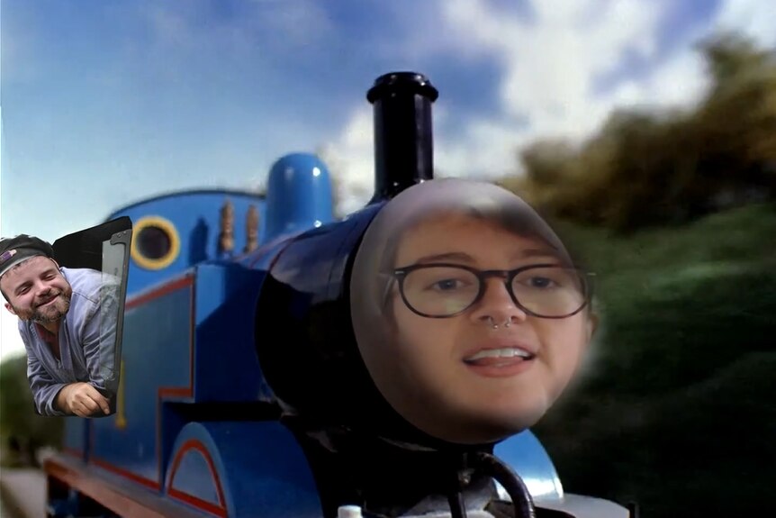 An image of Thomas The Tank Engine which has been digitally altered to include the faces of Sasha and his friend.