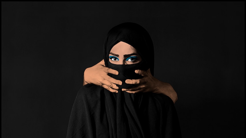 pop art photo of a muslim women in a black scarf with someone's hands around her mouth.