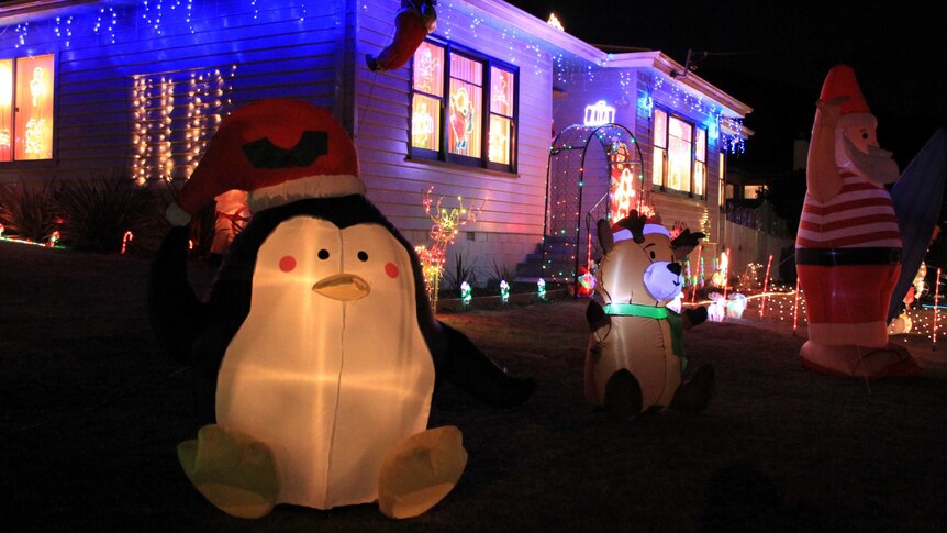 A glowing penguin on a lawn