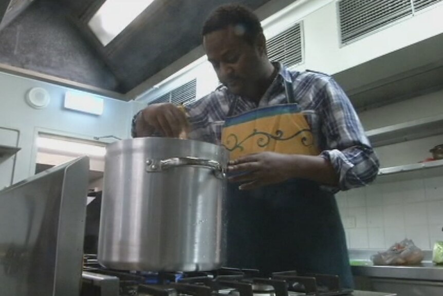 Tilahun Mengistu in the catering department