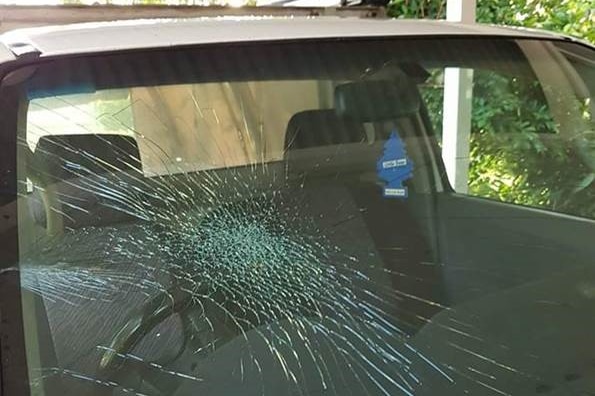 A smashed windscreen of a car.