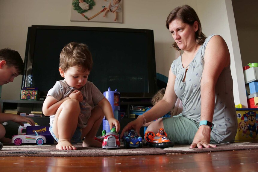 Merendi Leverett plays with her son Lachlan.